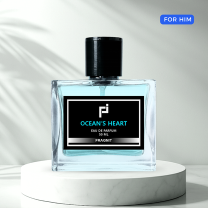 Ocean’s Heart by Fragnit – Fresh Woody Men’s Perfume Bottle with Blue Marine Background